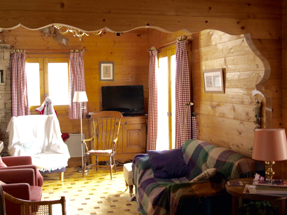 The living room has ample seating space for relaxation